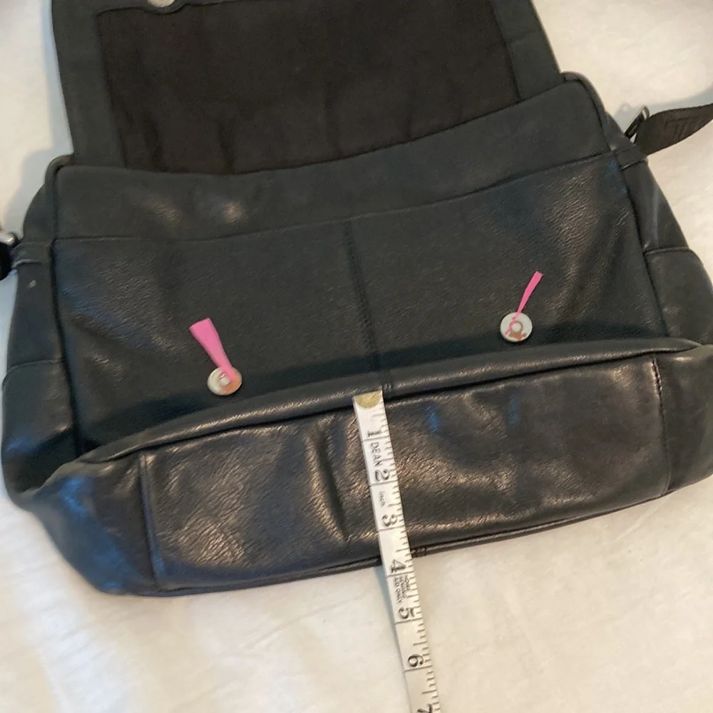 Tumi leather messenger tech lots of pockets